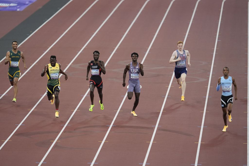 Botswana's Busang Collen Kebinatshipi, from right, Britain's Charles Dobson, United States' Jacory Patterson, Trinidad And Tobago's Jereem Richards, Jamaica's Rusheen McDonald and South Africa's Lythe Pillay compete in the men's 400 metres semifinal at the World Athletics Championships in Tokyo, Tuesday. Richards placed third and advanced as a non-automatic qualifier to the final.  AP PHOTO (Image obtained at guardian.co.tt)